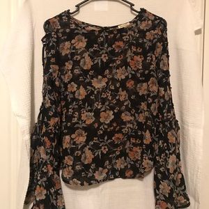 Black bell sleeve top
